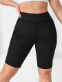 SHEIN Yoga Basic Plus Size Sports Training Shorts With Double Pockets