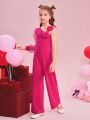 SHEIN Kids CHARMNG Girls' Knitted Solid Color Oblique-Shoulder Jumpsuit With Mesh & Bowknot Decoration