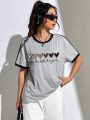 Heart & Slogan Graphic Contrast Binding Tee