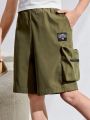 SHEIN Kids EVRYDAY Boys' Casual Solid Weave Shorts With Patch Label And 3d Pockets