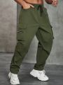 Extended Sizes Men's Plus Size Solid Color Wrinkle-design Zipper & Drawstring Waist Cargo Pants