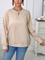 SHEIN Essnce Plus Solid Raglan Sleeve Sweatshirt