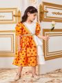 SHEIN Kids Nujoom Young Girls' Flower Printed Patchwork Layered Bubble Sleeves Dress With Round Neck