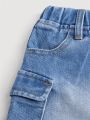 SHEIN Young Girls' New Light Blue Y2k Style Denim Skirt With Utility Pockets