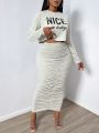 SHEIN SXY Slogan Printed Long Sleeve T-shirt And Pleated Midi Skirt 2pcs/set