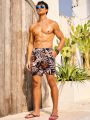 SHEIN Men's Tropical Printed Drawstring Waist Beach Shorts