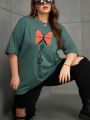Plus Size Women's Butterfly & Letter Printed Oversized T-shirt With Drop Shoulder