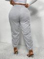 SHEIN SXY Plus Size Elastic Waist Sweatpants With Slanted Pockets