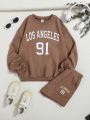 SHEIN Kids EVRYDAY Tween Girls' Letter Printed Sweatshirt And Shorts Set For Casual Or Sporty Outfit