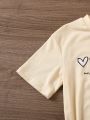 SHEIN Kids EVRYDAY Girls' Short Sleeve T-shirt With Heart Print And Slogan