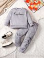 SHEIN Kids FANZEY Two-Piece Set Of Girls' Textured Letter Print Sweatshirt And Track Pants