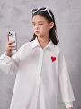 SHEIN Girls' Loose Fit Longline Shirt: Sweet, Cool, And Irregular; Heart Printed Shirt Dress