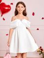 SHEIN Kids FANZEY Girls' Spaghetti Strap Off Shoulder Bow Knot Decorated Jacquard Dress