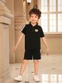 SHEIN Kids Academe Toddler Boys' Cute Bear Applique Plaid Polo Shirt And Shorts Set