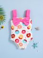 SHEIN Baby Girls' Cute Donut Pattern Color Block Swimsuit With Bow Decoration
