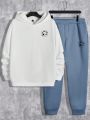 SHEIN Extended Sizes Men's Plus Size Hooded Sweatshirt & Pants Set With Smiling Face Print And Drawstring