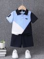 SHEIN Toddler Boys' Casual Color-block Dinosaur Pattern Polo Shirt And Shorts Set