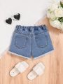 SHEIN Toddler Girls Ripped Raw Hem Denim Shorts