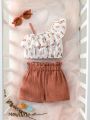 SHEIN Baby Floral Print Ruffle Trim Asymmetrical Neck Top & Paperbag Waist Shorts