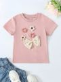 SHEIN Kids QTFun Girls' Short Sleeve T-shirt With 3d Flower & Bow Tie Decorated Round Neck