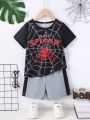 SHEIN Kids QTFun Toddler Boys' Streetwear Outdoor Letter Spider Web Printed Short Sleeve Top And Shorts Set For Summer