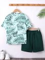 SHEIN Kids SUNSHNE Tween Boys' Vacation Style Round Neck Short Sleeve Knitwear Top With Leaf Print And Solid Color Woven Shorts 2pcs/set