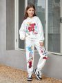 SHEIN Kids EVRYDAY 2pcs/set Teen Girls' Knitted Loose Fit Hoodie With Graffiti Letter Printing And Wide Leg Jogger Pants